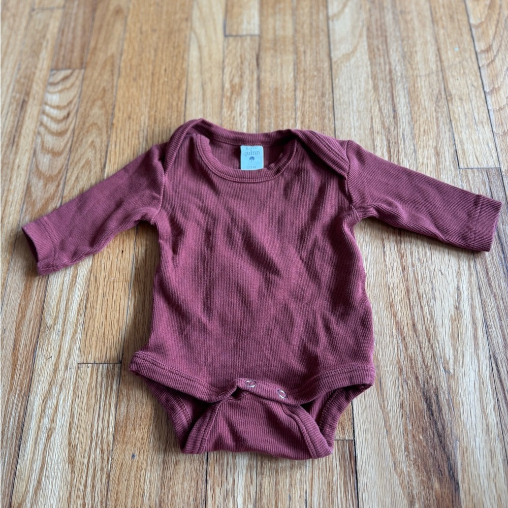 Kate Quinn Rust Long Sleeve Baby Onesie